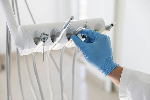 Professional Emergency Dentist technician working in Naples Park, FL